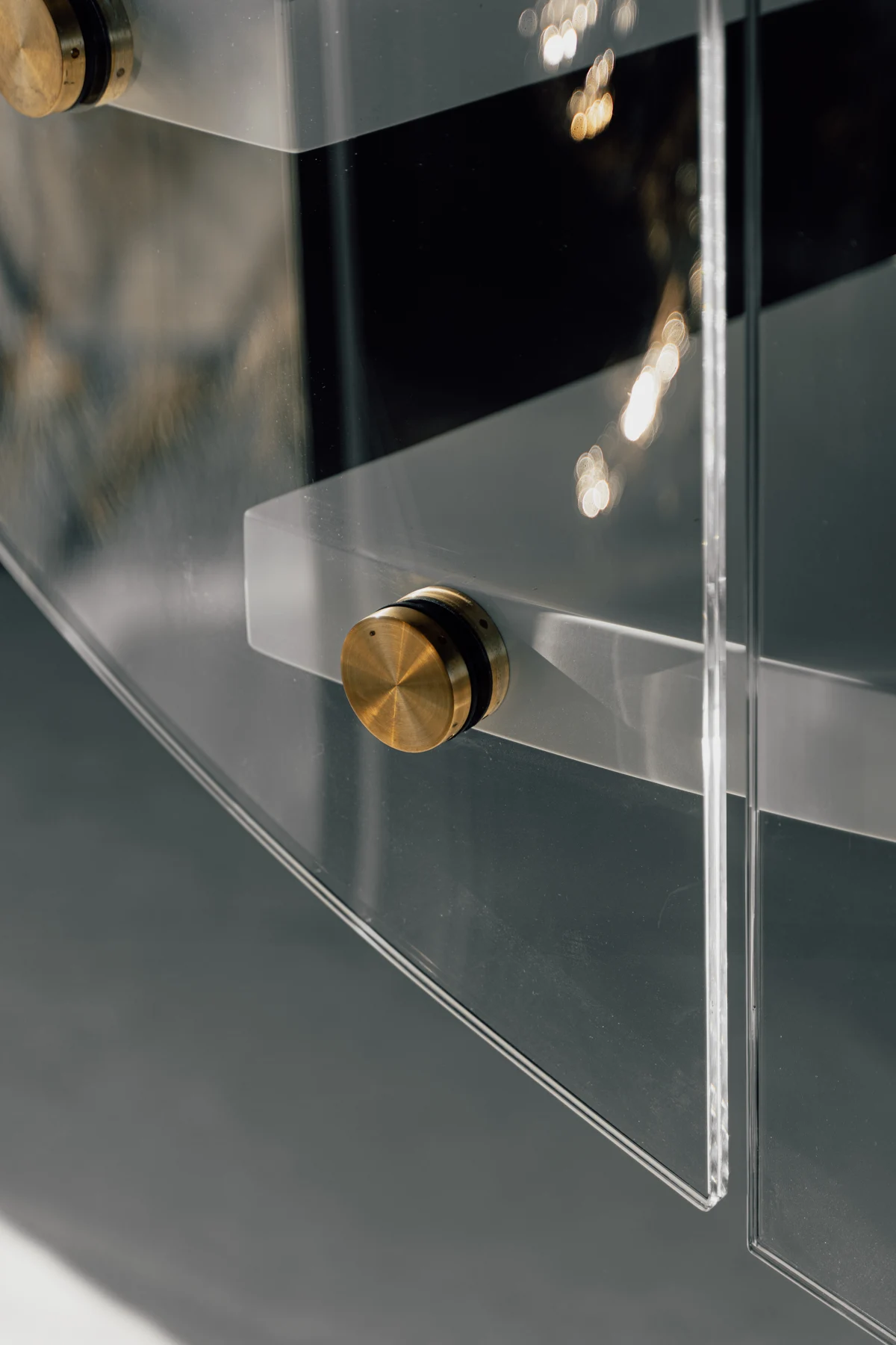 Detail of a round glass balustrade fixing