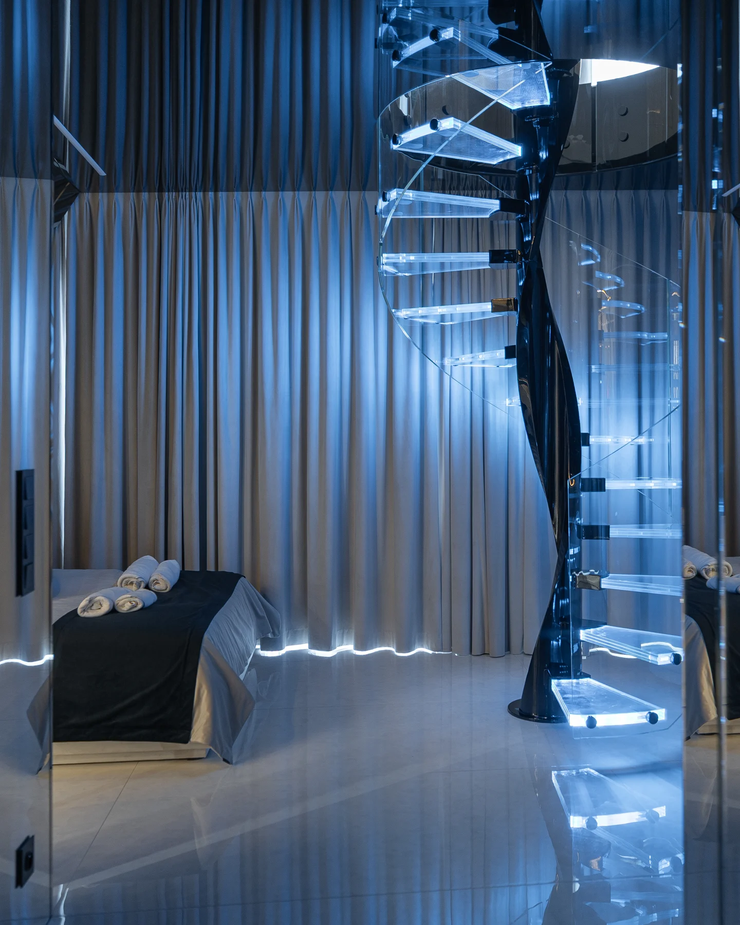 Illuminated spiral staircase — view 06